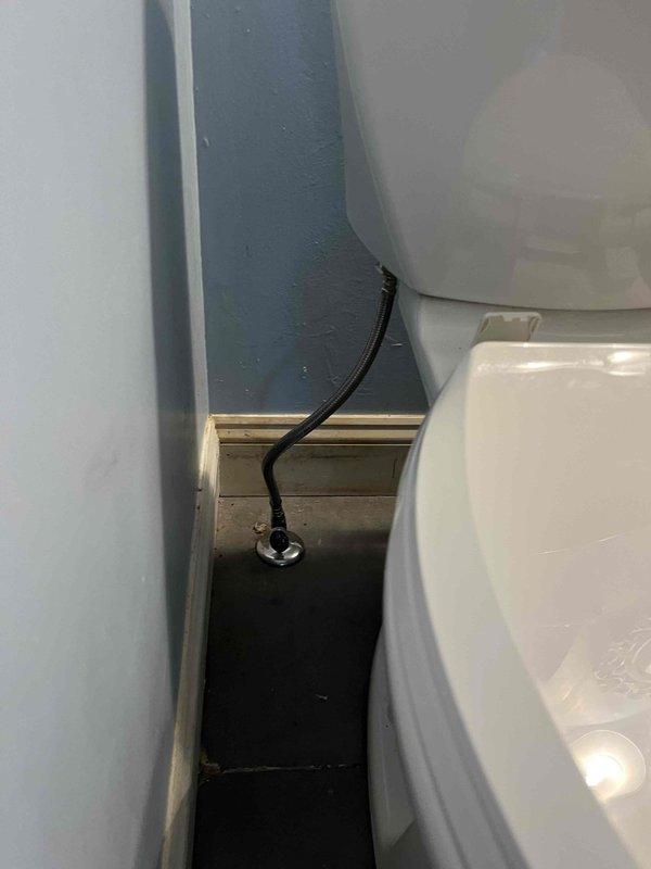Responded to service call for toilet leaking at base. Upon inspection, identified water seepage from beneath the toilet where it meets the floor, indicating a failed wax ring seal. Removed toilet from floor flange, scraped old wax ring residue, and installed new wax ring. Reset toilet to proper position, secured with closet bolts, and tested for leaks to confirm repair was successful.