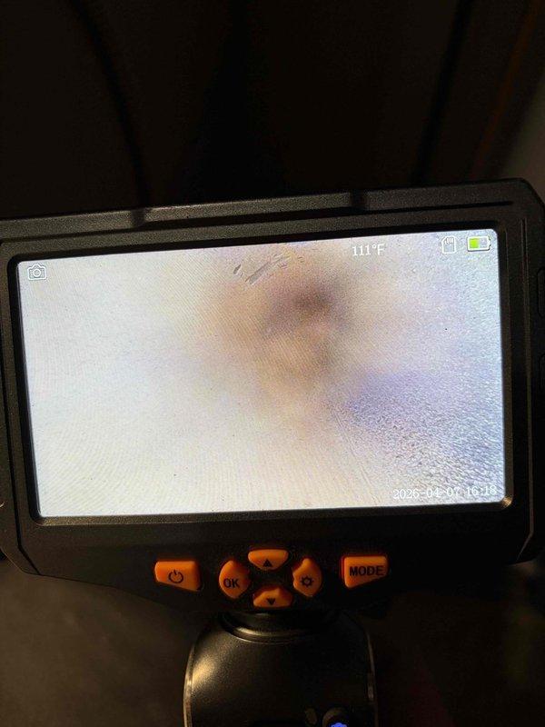 Responded to no heat call and diagnosed failed blower motor that was seized and making squealing noise. Used inspection camera to verify internal motor damage and confirmed complete motor failure. Replaced defective blower motor and restored heating operation to system.