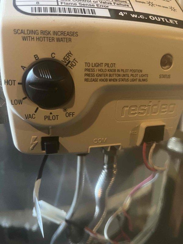 Responded to service call for leaking gas water heater requiring replacement. Upon inspection, confirmed active leak from existing unit, a Lochinvar brand tank-style gas water heater showing signs of age and deterioration. Based on installation space constraints and customer requirements, determined need for short-style 40-gallon gas water heater replacement.

Documented existing installation configuration including gas control valve assembly with Resideo controller, copper supply and distribution piping, expansion tank mounted to overhead joists, and connection to gas supply line with shutoff valve. Photographed gas control settings, thermocouple connections, and overall mechanical room layout showing integration with HVAC system and plumbing infrastructure.

Assessed installation requirements for replacement unit to match existing footprint and clearance specifications in basement utility area. Verified gas supply compatibility and existing venting configuration to ensure proper repl