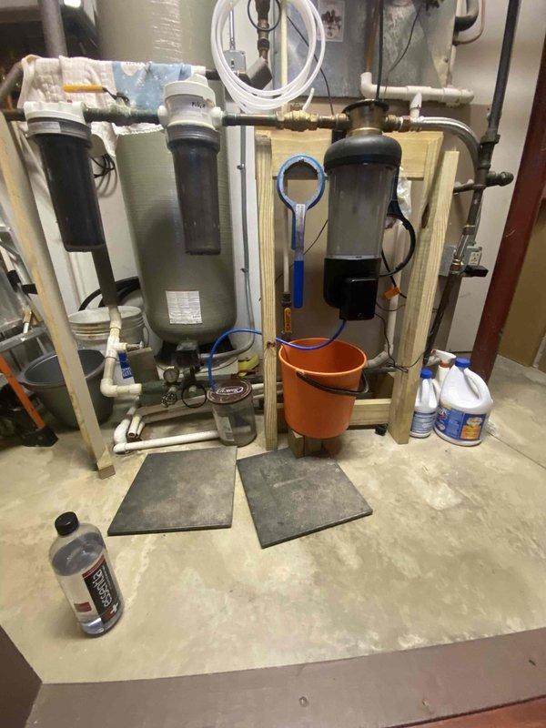 Performed HVAC system replacement estimate for 22-year-old gas furnace and air conditioning system. The existing heating unit has failed and is no longer operational, while the outdoor condensing unit shows significant age-related wear. Documented current equipment configuration including outdoor AC condenser positioned on gravel pad with proper clearances, electrical service connections, and overall system layout to provide comprehensive replacement recommendations for both heating and cooling components.