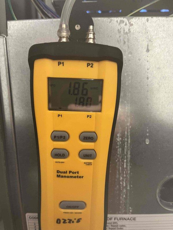 Completed heating maintenance club visit on air handler system. Performed electrical diagnostics using clamp meter, recording amperage draw of 0.28 amps on system components. Measured static pressure differential across system using dual port manometer, with readings of 186 and 180, indicating proper airflow through the unit. All measurements within manufacturer specifications, confirming system operating efficiently for the heating season.