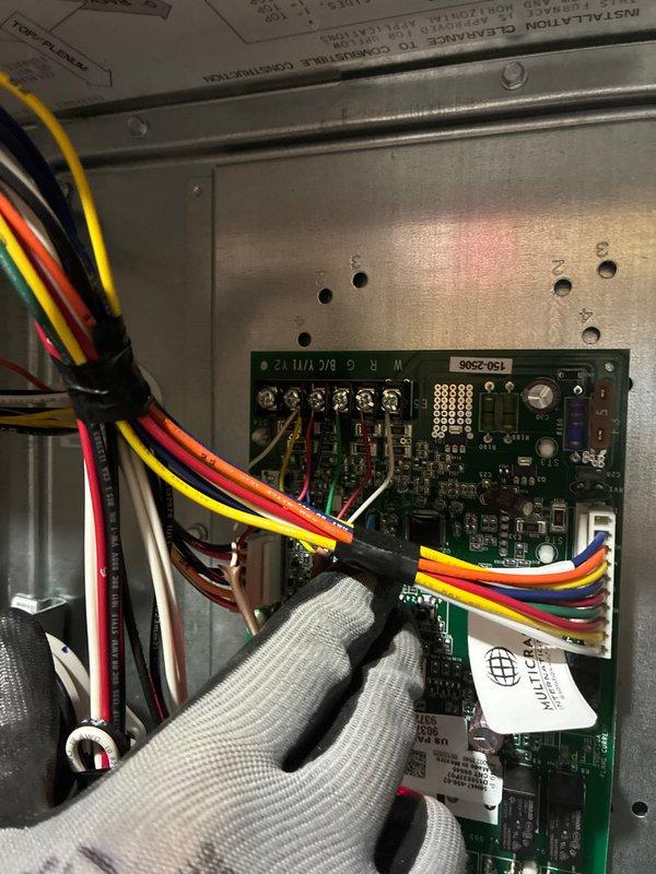 Completed installation of Ameristar 60,000 BTU 80% efficient single stage furnace in basement utility area. Installed and wired control boards, connected all electrical components, verified blower motor operation, routed condensate drain piping, and performed system diagnostics confirming unit operational at 48.9 degrees temperature differential.