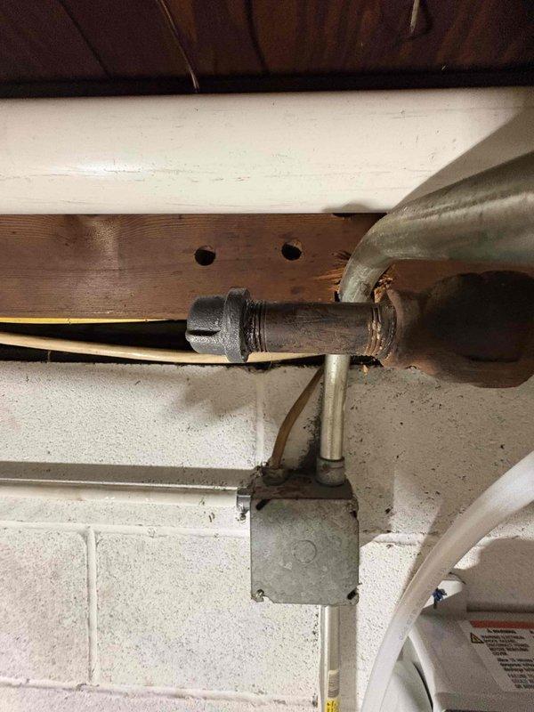 Performed return service call for constant pressure system, well pump, and water softener installation in Arizona. Inspected plumbing connections, pressure tank components, and water supply lines in basement utility area to verify proper operation and system integration. All mechanical components, pipe fittings, and electrical connections confirmed functioning correctly with no leaks or operational issues detected.