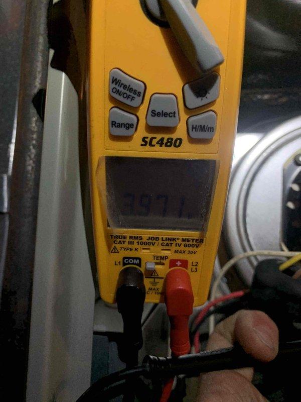 Responded to emergency no-heat call for 11-year-old furnace system. Upon arrival, performed diagnostic testing using digital multimeter to check electrical supply and component functionality. Measured incoming line voltage at 121V and verified proper power delivery to unit. Conducted comprehensive system evaluation including voltage testing across control circuits and component terminals to isolate the failure point preventing furnace operation. Documented findings with diagnostic meter readings showing electrical measurements at key test points throughout the heating system.