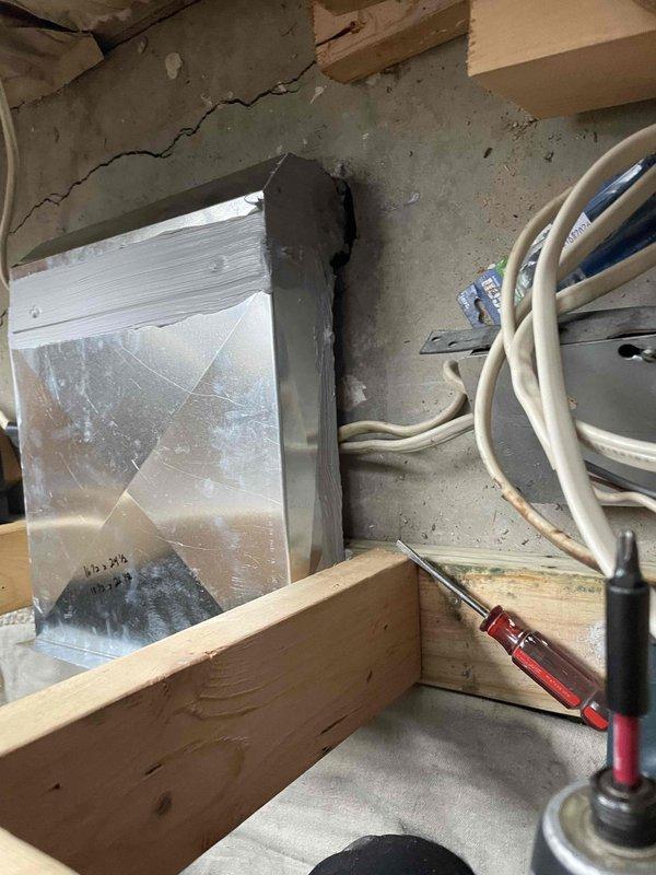 Returned to property to complete installation of toe kick boot for HVAC system. Successfully installed metal boot assembly with flexible duct connection to existing ductwork in basement area, secured with proper framing and support structure to ensure optimal airflow distribution.