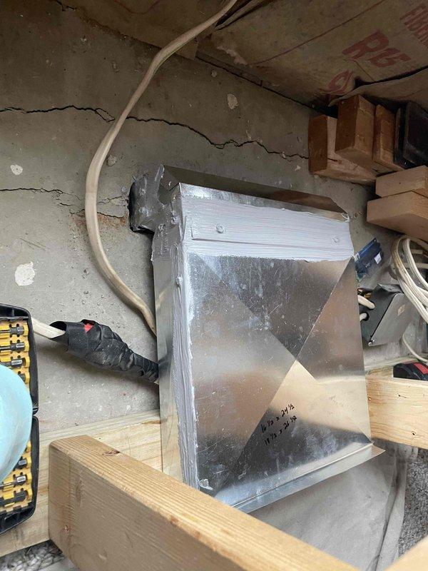 Returned to property to complete installation of toe kick boot for HVAC system. Successfully installed metal boot assembly with flexible duct connection to existing ductwork in basement area, secured with proper framing and support structure to ensure optimal airflow distribution.