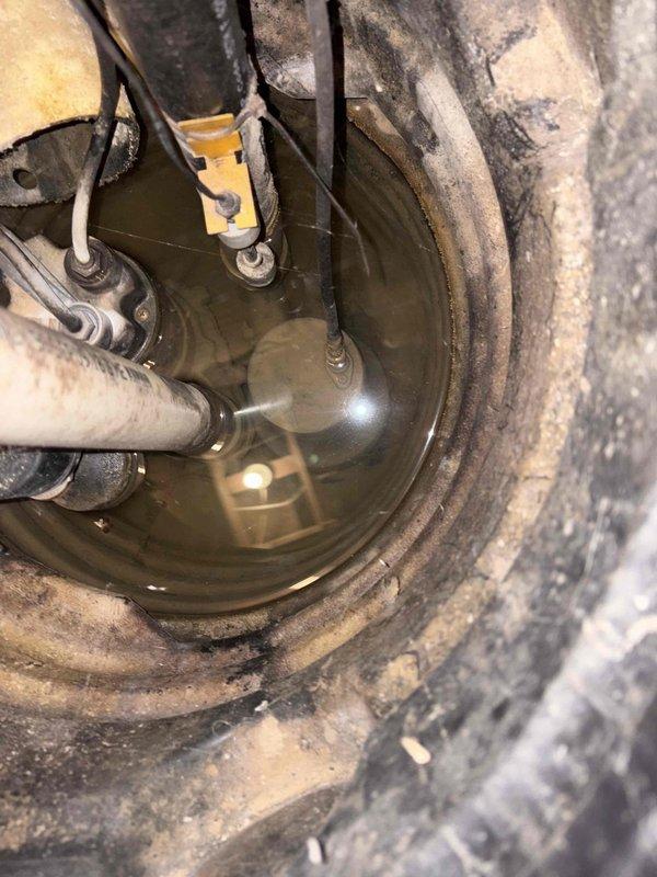 Responded to service call for sump pump system with failed battery backup unit. Upon inspection, determined the 12V backup battery had reached end of service life and required replacement. Installed new PRO SERIES 12V 100Ah sealed lead-acid battery to restore backup pump functionality. During assessment, noted the primary submersible sump pump predates the backup system and exhibits age-related wear consistent with extended service. Performed visual inspection of pump basin, discharge piping, float mechanisms, and electrical connections. Recommended monitoring system performance and considering primary pump replacement in near future to prevent potential failure during high-demand periods.