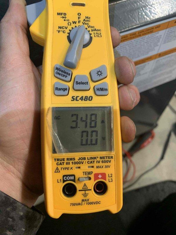 Responded to no-heat call for furnace system. Upon inspection, diagnosed failed inducer motor preventing unit operation. Observed significant rust and corrosion in condensate collection pan indicating moisture accumulation and drainage issues. Performed electrical testing with multimeter to verify motor failure, confirming 3.48-amp draw inconsistent with normal operating parameters. Identified inducer motor assembly requiring replacement due to mechanical failure and associated rust damage to surrounding components from prolonged moisture exposure.