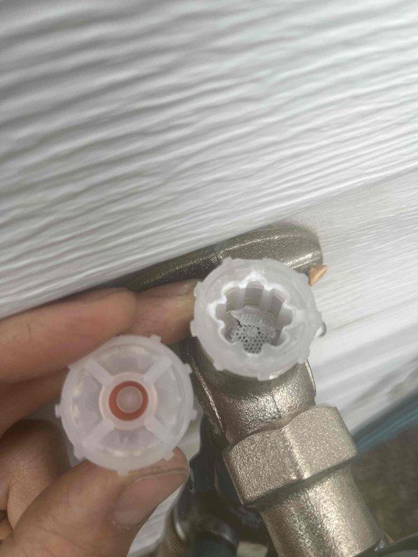 Responded to service call for outdoor spigot installed previously that was leaking from the top valve assembly. Upon inspection, identified failed valve seat washer and worn control handle mechanism causing water to spray from the top of the fixture rather than flowing properly through the outlet. Disassembled the spigot valve body, removed deteriorated internal components, and replaced faulty valve seat and handle assembly with new parts. Tested the repaired spigot with hose attachment to verify proper water flow and confirmed no leakage from valve body or handle area. Unit now operates correctly with full shut-off capability restored.