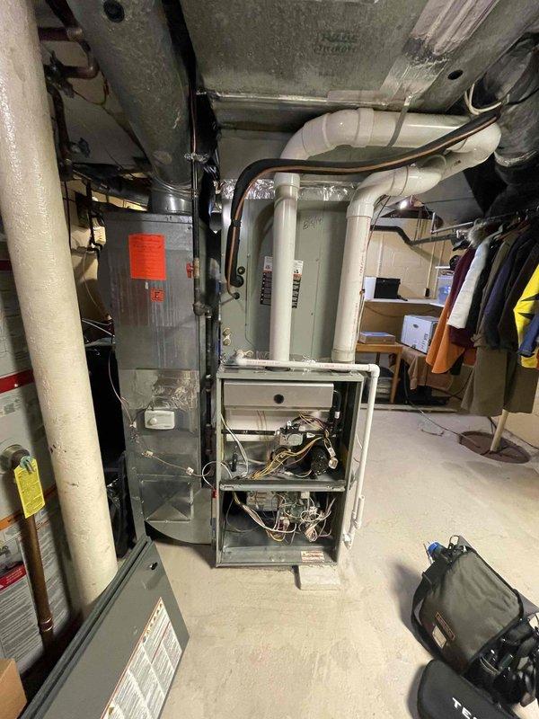Completed comprehensive dual fuel heating system maintenance and inspection per club membership agreement. Performed thorough visual inspection of furnace unit with access panel removed, examining internal components including control board, wiring connections, and mechanical assemblies. Utilized inspection camera equipment to examine ductwork and ventilation system interior for obstructions, debris, or deterioration. Inspected associated water heater and surrounding infrastructure including PVC vent piping and condensate drainage systems. All equipment found operating within normal parameters with no immediate service concerns identified.