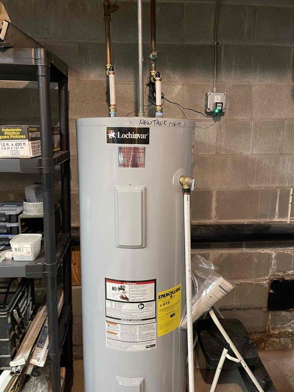 Returned to property to install two powered anode rods in Lochinvar water heater unit. Successfully removed existing anode rods and replaced with powered anode rod system to provide enhanced corrosion protection and extend tank lifespan. Verified all electrical connections, tested system operation, and confirmed proper installation of both units with secure mounting at top of water heater tank.