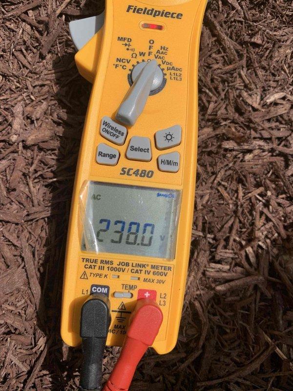 Completed cooling maintenance for club member air handler system. Performed electrical diagnostics using digital multimeter, recording voltage readings of 238V AC and 480.7V to verify proper system operation and electrical integrity. Documented equipment conditions with photos for maintenance records.