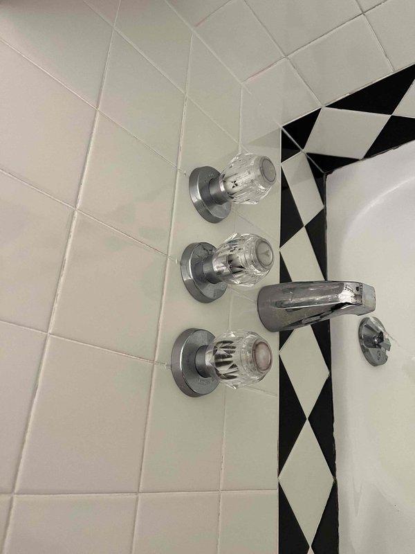 Completed return visit for cracked clay pipe replacement with PVC piping. Installed new toilet in bathroom with mosaic tile walls and performed leak repair behind dryer unit. All plumbing fixtures tested and verified operational upon completion.