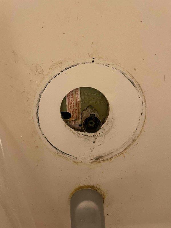 Responded to shower leak complaint affecting flooring below. Upon inspection, identified deteriorated shower drain assembly with compromised seal allowing water penetration through subfloor. Removed existing drain flange and cleaned surrounding area. Installed new drain assembly with proper waterproof gasket and verified secure seal to prevent further water intrusion. Tested system for proper drainage and confirmed no active leaks.