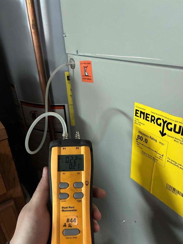 Performed system start-up and diagnostic testing on residential air conditioning unit. Utilized digital manometer and Fieldpiece diagnostic equipment to measure system pressures, temperatures, and verify proper refrigerant charge. Confirmed system operating parameters with superheat reading of 119.7°F and subcooling of 232.9°F, with diagnostic tool indicating correct charge status. System tested and verified operational.