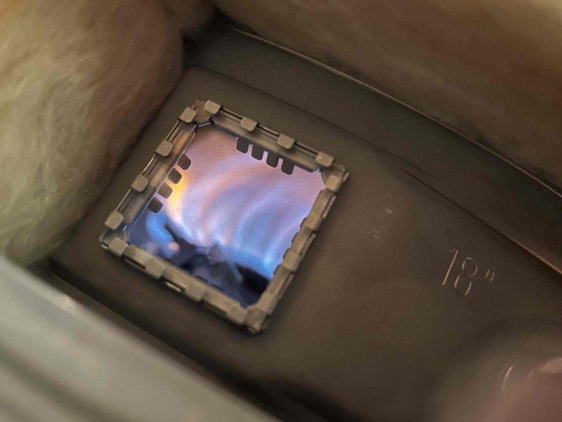 Installed 50-gallon A.O. Smith standard vent gas water heater with drip pan capped per customer request to eliminate above-ground tripping hazard. Unit installed with proper gas connections, verified burner ignition and flame pattern, and confirmed all safety labels and specifications are visible on exterior of tank.
