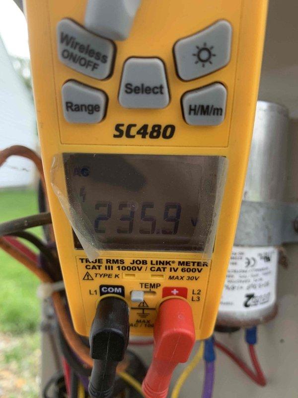 Completed annual AC tune-up on one-year-old system. Performed comprehensive maintenance inspection including electrical testing with multimeter, which showed normal voltage readings at 235.9V. Inspected air filter and found it in acceptable condition with light dust accumulation; advised customer that filter does not require immediate replacement but should be monitored. Verified all system components operating within normal parameters. System running efficiently with no issues identified.