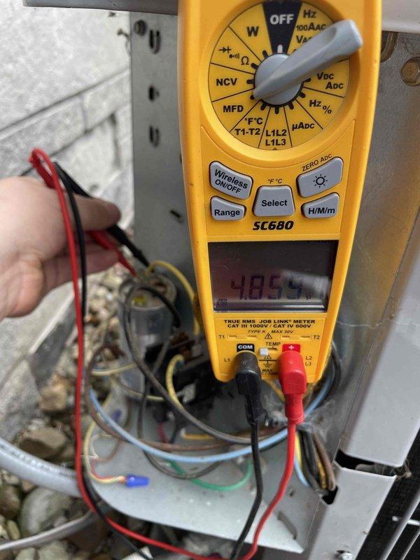 Completed comprehensive AC and minisplit maintenance as part of club membership visit. Performed electrical diagnostics using digital multimeter, verifying voltage readings at control panel and outdoor condenser unit. Tested system components including capacitor measurements and voltage supply to ensure proper operation. Inspected outdoor unit refrigerant lines, electrical connections, and condenser coil condition. All systems tested within normal operating parameters and membership plan renewed for continued service coverage.
