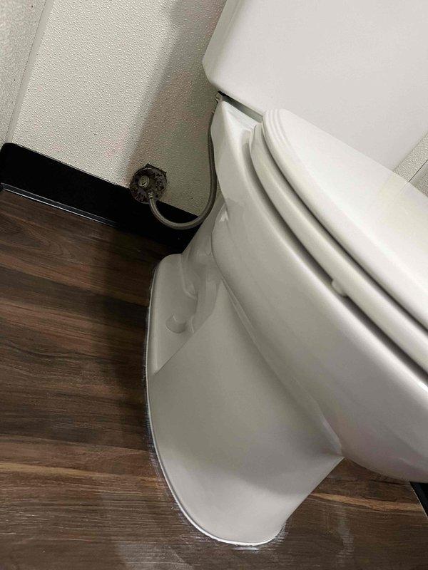 Responded to callback for water leaking around toilet base and improper flushing. Upon arrival, found missing closet bolt causing toilet instability. Reset and resealed toilet to floor flange with new wax ring and hardware. Verified proper flush operation and confirmed no leaks at base after testing. Toilet restored to proper working condition.