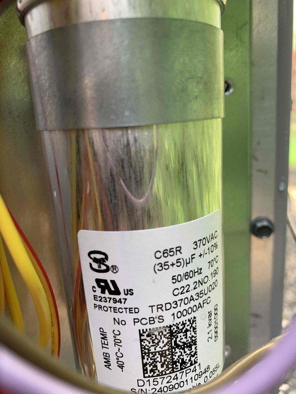 Completed routine cooling maintenance visit under preventative maintenance plan. Inspected and tested dual-run capacitor (C65R model, 370VAC rated at 35+5 μF) for proper operation and measured voltage at 54.1 VAC to verify electrical supply to HVAC system components.