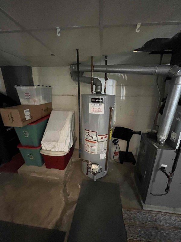 Addressed multiple plumbing issues throughout the property, including repairing a leaking outdoor spigot at the base, servicing an aging hot water supply line at the basement washer tub, and clearing a slow-draining main floor bathroom sink. Applied senior and veteran discount to the service call.