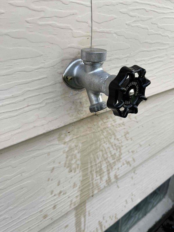 Responded to outdoor spigot dripping issue and successfully replaced worn compression washer that was causing water to leak after valve closure. Removed deteriorated washer component, installed new replacement part, and verified complete water shutoff with no residual dripping, restoring proper function to the hose bib assembly.