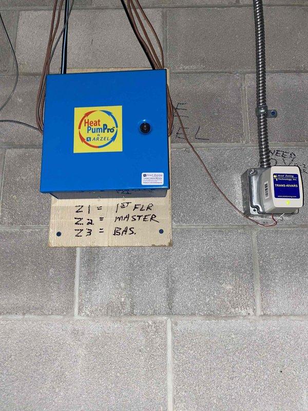 Evaluated existing multi-zone HVAC system with Heat Pump Pro by ARZEL zoning controls serving three zones (first floor, master bedroom, and basement). Assessed equipment configuration and documented current system layout in mechanical space. Provided comprehensive replacement options for the multi-zone heat pump system to address customer's equipment needs.