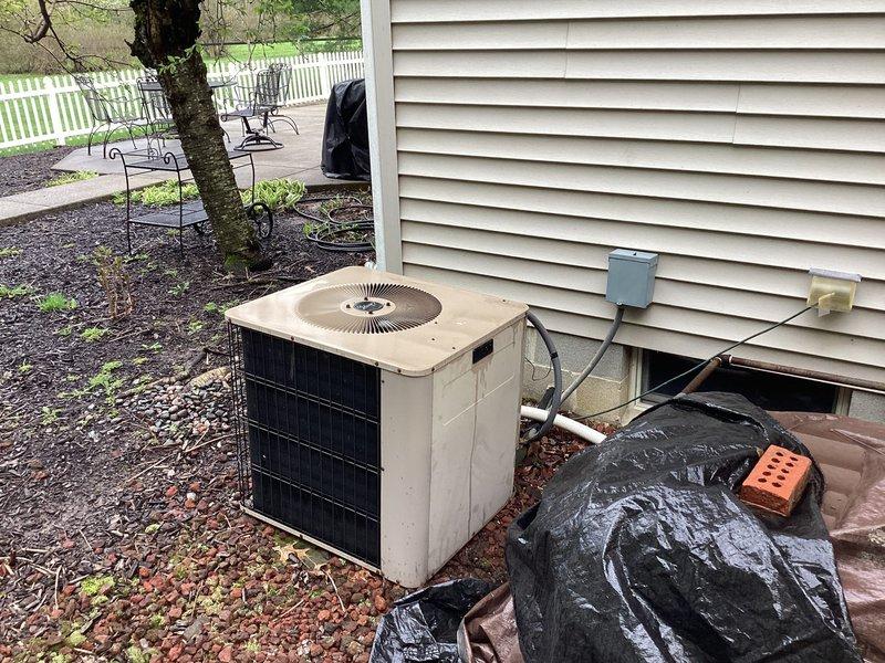 Completed comprehensive HVAC system replacement estimate for residential property, assessing existing furnace and air conditioning equipment for full system upgrade. Documented current basement furnace installation location and outdoor condenser unit positioning, noting existing electrical disconnect, refrigerant line routing, and condensate drainage requirements for replacement specifications.