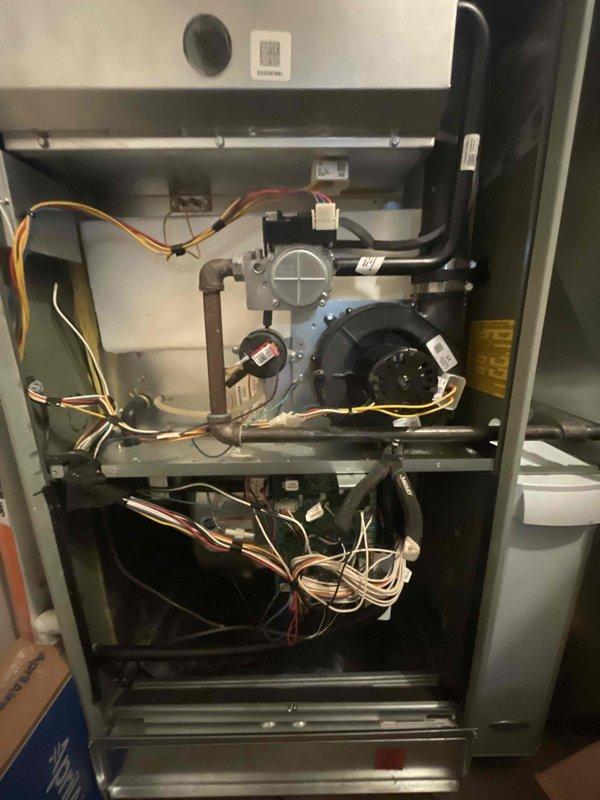 Completed maintenance plan renewal inspection on residential furnace system. Diagnosed failed inducer motor assembly during routine inspection and sold replacement unit to customer. Ordered OEM inducer motor with expected delivery within 2-3 business days. Accessed furnace cabinet and documented current blower motor assembly, internal wiring harnesses, and existing inducer motor connections for replacement preparation. System components including blower assembly, electrical connections, and ductwork inspected and photographed for service records. Unit remains operational pending inducer motor replacement upon parts arrival.