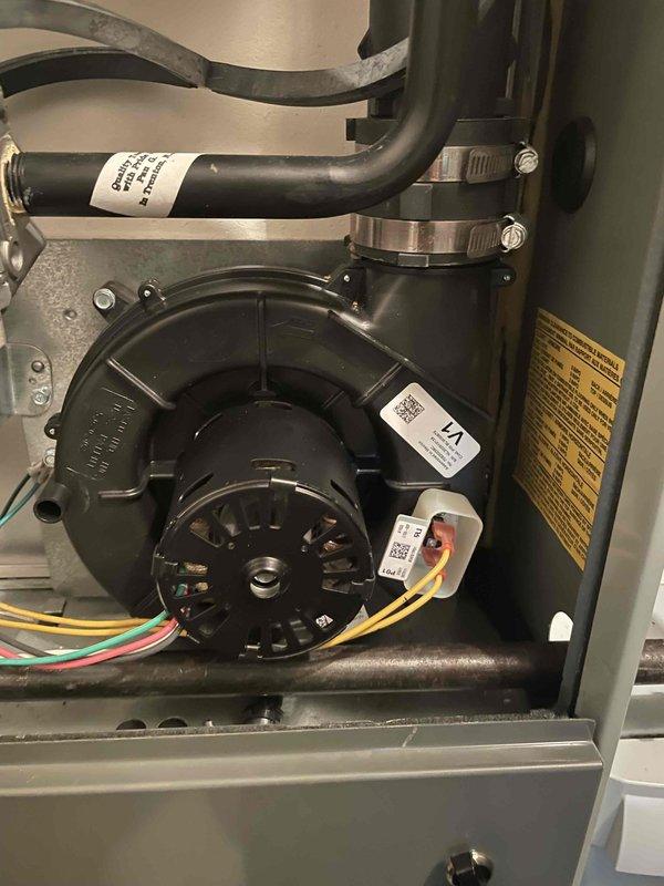 Completed maintenance plan renewal inspection on residential furnace system. Diagnosed failed inducer motor assembly during routine inspection and sold replacement unit to customer. Ordered OEM inducer motor with expected delivery within 2-3 business days. Accessed furnace cabinet and documented current blower motor assembly, internal wiring harnesses, and existing inducer motor connections for replacement preparation. System components including blower assembly, electrical connections, and ductwork inspected and photographed for service records. Unit remains operational pending inducer motor replacement upon parts arrival.