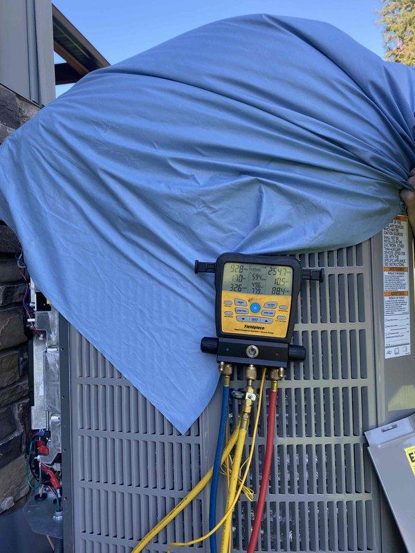 Completed initial commissioning and setup of one-year-old air conditioning system that was never properly started up after installation. Performed comprehensive system diagnostics including static pressure measurements using digital manometer, verifying airflow and duct system performance with readings of 0.18 and 0.16 inches water column. Connected refrigerant manifold gauge set to outdoor condensing unit and verified proper refrigerant charge levels and system pressures. Conducted full operational testing to ensure equipment is functioning within manufacturer specifications and ready for regular service scheduling.