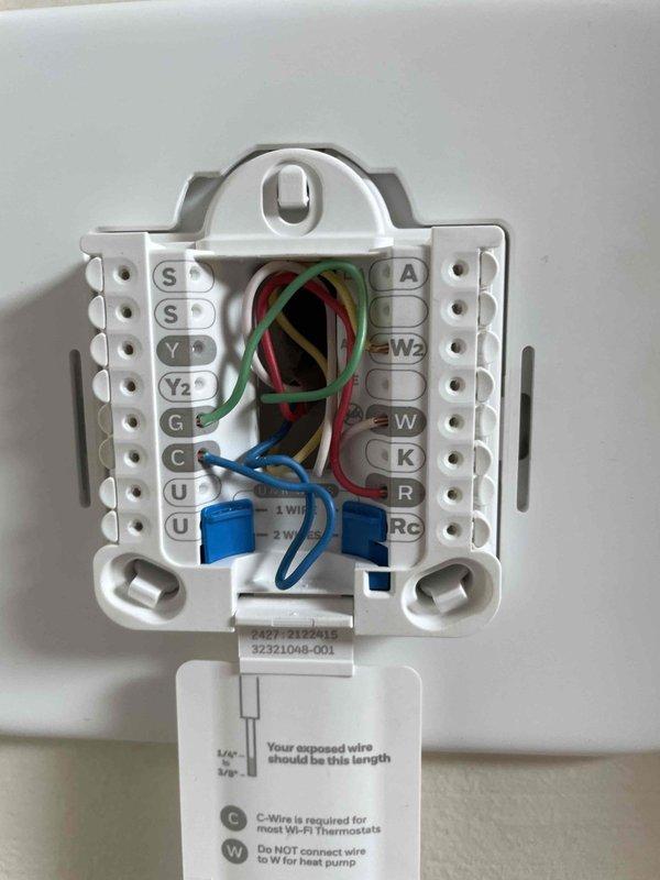 Responded to emergency no-heat call on recently installed furnace system. Upon arrival, found thermostat non-operational with homeowner reporting extremely cold conditions. Diagnosed issue as improper low-voltage wiring connections at thermostat baseplate. Removed thermostat faceplate and identified multiple loose and incorrectly terminated wire connections, including improperly installed wire nuts on control wiring. Stripped and re-terminated all low-voltage conductors, ensuring proper connections to R, W, G, Y, and C terminals according to manufacturer specifications. Verified all wire gauge and connections met code requirements for thermostat communication with furnace control board. Restored power, cycled thermostat through heating mode, and confirmed furnace ignition sequence and proper operation. System now heating normally with thermostat responding correctly to temperature calls.