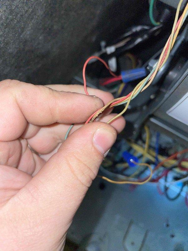 Responded to emergency no-heat call on recently installed furnace system. Upon arrival, found thermostat non-operational with homeowner reporting extremely cold conditions. Diagnosed issue as improper low-voltage wiring connections at thermostat baseplate. Removed thermostat faceplate and identified multiple loose and incorrectly terminated wire connections, including improperly installed wire nuts on control wiring. Stripped and re-terminated all low-voltage conductors, ensuring proper connections to R, W, G, Y, and C terminals according to manufacturer specifications. Verified all wire gauge and connections met code requirements for thermostat communication with furnace control board. Restored power, cycled thermostat through heating mode, and confirmed furnace ignition sequence and proper operation. System now heating normally with thermostat responding correctly to temperature calls.