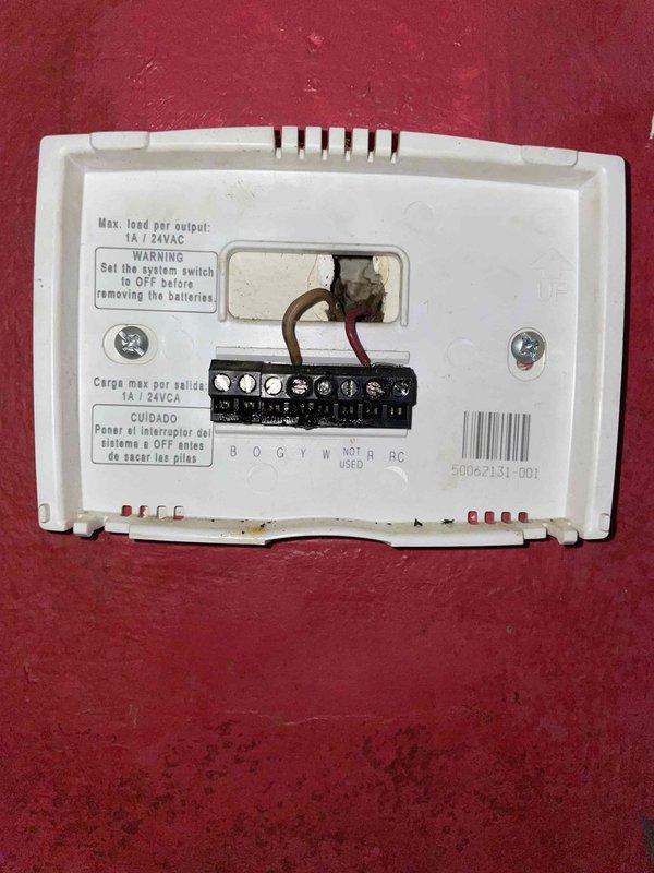 Responded to no-heat service call on 5-year-old oil furnace that failed to start following recent fuel delivery. Upon arrival, performed diagnostic inspection of heating system including thermostat operation and furnace controls. Inspected fuel oil system components including oil filter and fuel line assembly. Verified proper thermostat wiring connections at wall-mounted control unit. Checked fuel supply level using sight glass gauge and confirmed adequate oil present in tank. Restored furnace to normal operation and verified heating cycle completion. System tested and left in working condition.