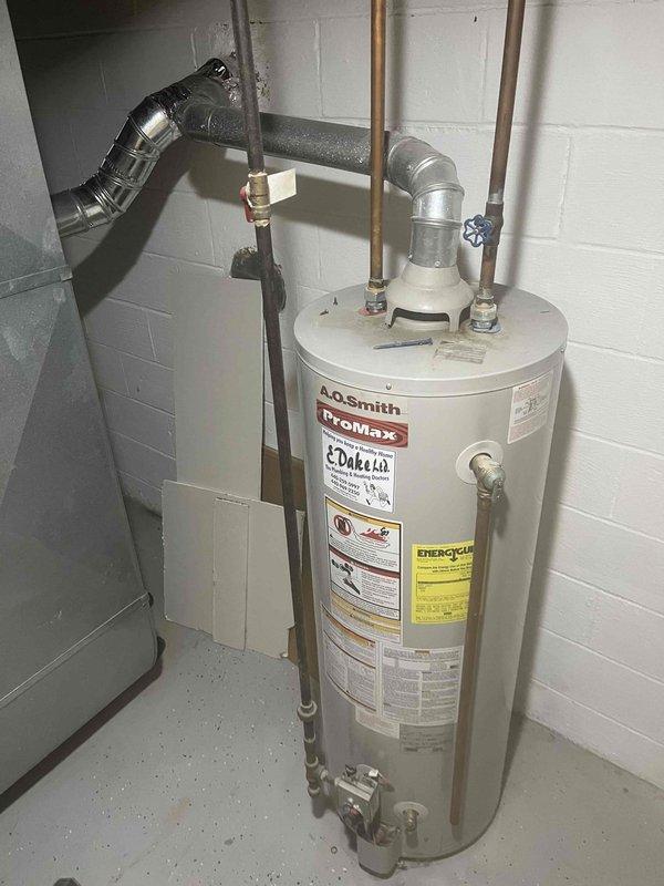 Diagnosed low water pressure issue caused by aging well pump system experiencing frequent cycling due to pressure loss. Inspected existing well pump pressure control equipment, including vintage Trumbull Electric pressure switch showing significant age and wear. System assessment revealed pressure retention problems causing pump to activate repeatedly, indicating likely failure of pressure tank bladder or switch calibration issues requiring replacement of aged components to restore proper water pressure and prevent premature pump failure.