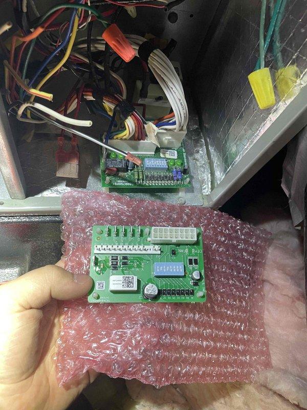Returned to property to install replacement fan control board previously sold to customer. Removed existing defective control board from HVAC unit and installed new OEM green circuit board with integrated display and LED indicators. Connected all necessary wiring harnesses including power, control signals, and sensor inputs to appropriate terminals on the new board. Verified all wire connections were secure at terminal blocks and tested system operation. Unit powered up successfully with proper LED indication and fan motor operation confirmed.