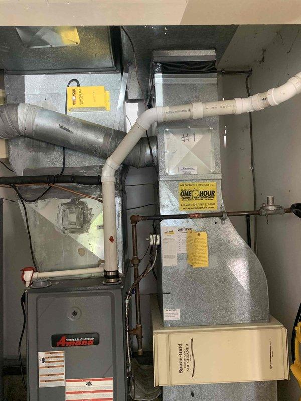 Completed HVAC maintenance club visit and system inspection. Performed comprehensive evaluation of indoor air handler unit and outdoor condensing unit, documenting equipment condition with photos. Inspected electrical components, capacitor, wiring connections, and control panel in outdoor unit, noting signs of environmental exposure and normal wear. Verified proper operation of furnace, ductwork connections, and PVC piping systems in basement installation. Customer enrolled in maintenance club program during this visit.