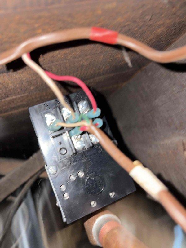 Responded to service call for leaking White Rodgers zone valve on hydronic heating system. Drained boiler, removed failed zone valve by unsweating copper connections, and installed new White Rodgers 1361-102 Zone-A-Flow valve with 3/4" connections. Soldered new valve into copper piping, refilled boiler system, and bled air from all zones to ensure proper circulation. Verified electrical connections to zone valve actuator and confirmed proper operation of heating zone. Completed boiler maintenance plan inspection including system pressure check and operational testing of all components.