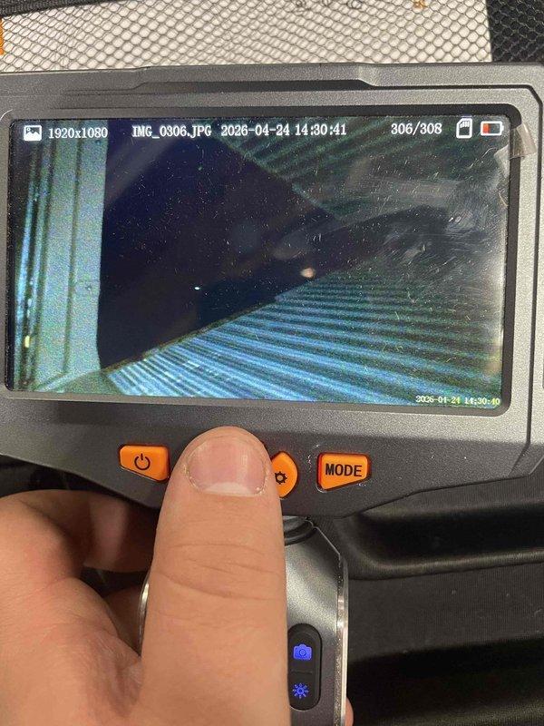 Completed routine HVAC club maintenance visit on air handler system. Performed diagnostic testing using clamp meter to verify electrical readings and system operation, with measurements indicating normal amperage draw. Conducted internal ductwork inspection using borescope camera to assess cleanliness and condition of flexible duct system, documenting interior surfaces and airflow pathway for maintenance records.