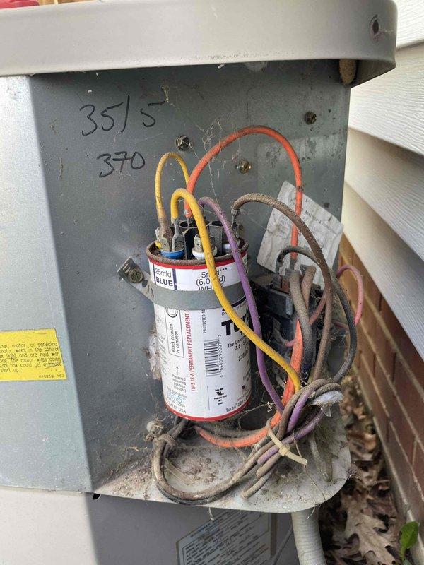 Responded to service call for non-responsive thermostat affecting air conditioning system. Upon inspection, diagnosed failed dual run capacitor in outdoor condensing unit, evidenced by bulging case and out-of-spec readings. Replaced defective capacitor with proper rated unit, verified all electrical connections secure, and tested system operation. Unit now cooling properly with thermostat responding correctly to input commands.
