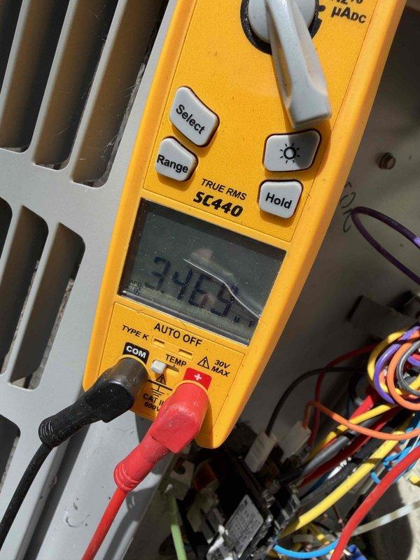Completed comprehensive AC tune-up on 10+ year old system operating within normal parameters. Performed electrical diagnostics using digital multimeter, verified proper voltage readings at control board and measured system amperage. Inspected exterior disconnect box, conduit connections, and all electrical components for safe operation.