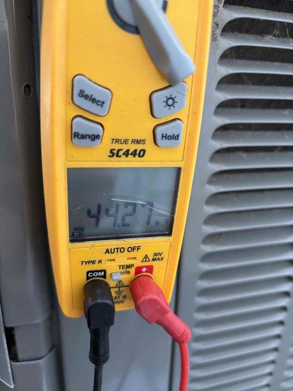 Completed scheduled cooling maintenance for club member. Performed temperature diagnostics on air handler unit using digital multimeter, recording operating temperature of 42.7°F. Inspected blower wheel assembly and documented moderate dust and debris accumulation on squirrel cage blades affecting airflow efficiency. Unit operational at time of inspection.