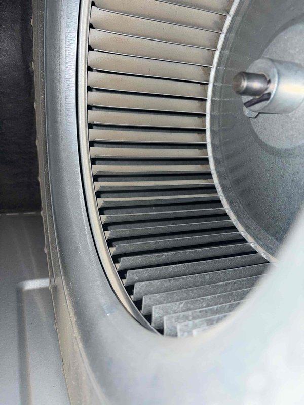 Completed scheduled cooling maintenance for club member. Performed temperature diagnostics on air handler unit using digital multimeter, recording operating temperature of 42.7°F. Inspected blower wheel assembly and documented moderate dust and debris accumulation on squirrel cage blades affecting airflow efficiency. Unit operational at time of inspection.