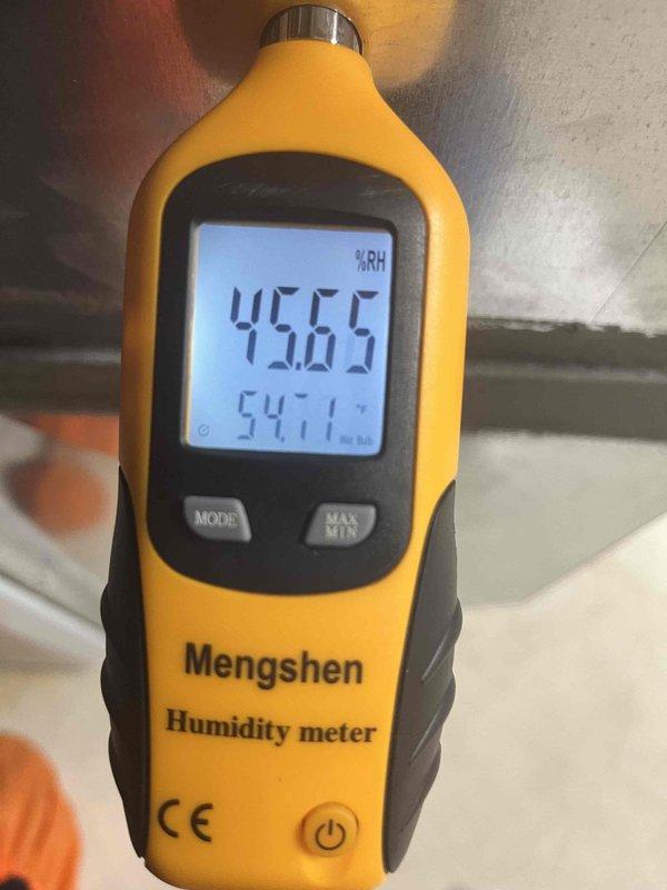 Completed prepaid cooling maintenance visit on air handler unit. Performed electrical diagnostics using multimeter, verifying amp draw at 1.3A and checking capacitor operation with all wire connections secure. Measured and recorded indoor air conditions at 54.7°F and 45.05% relative humidity, confirming proper system performance and airflow.