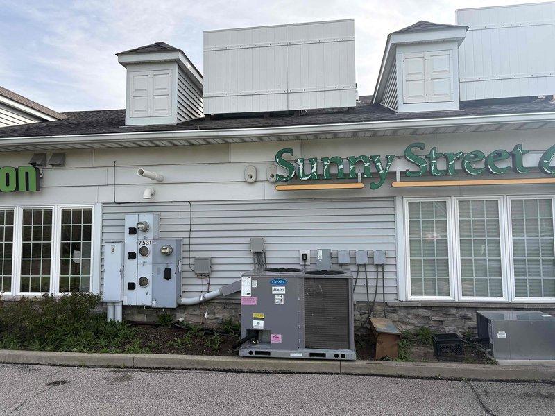 Conducted commercial mini split system evaluation for restaurant facility. Assessed existing HVAC infrastructure including rooftop units and exterior condensing equipment, documented current system configuration and building layout to provide estimate for mini split installation in commercial kitchen and dining areas.