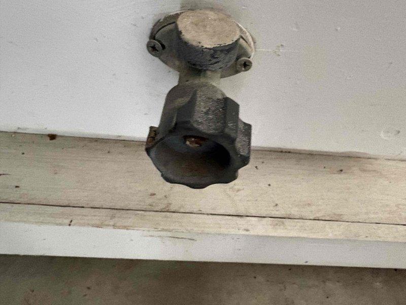 Replaced two outdoor hose bibs that were no longer functioning properly. The first spigot was a freeze-proof wall hydrant with a green handle wheel valve installed at foundation level, and the second was a ceiling-mounted fixture located under an exterior overhang or soffit area. Both fixtures were successfully replaced and tested for proper operation and leak-free performance.