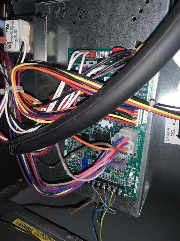 Completed cooling maintenance club visit on residential HVAC system. Performed electrical diagnostics using calibrated multimeter, recording voltage reading of 243.2V at the unit. Inspected internal control boards and verified proper wiring connections throughout the system, including low-voltage thermostat circuits and main power distribution. All components operating within normal parameters with no deficiencies noted.