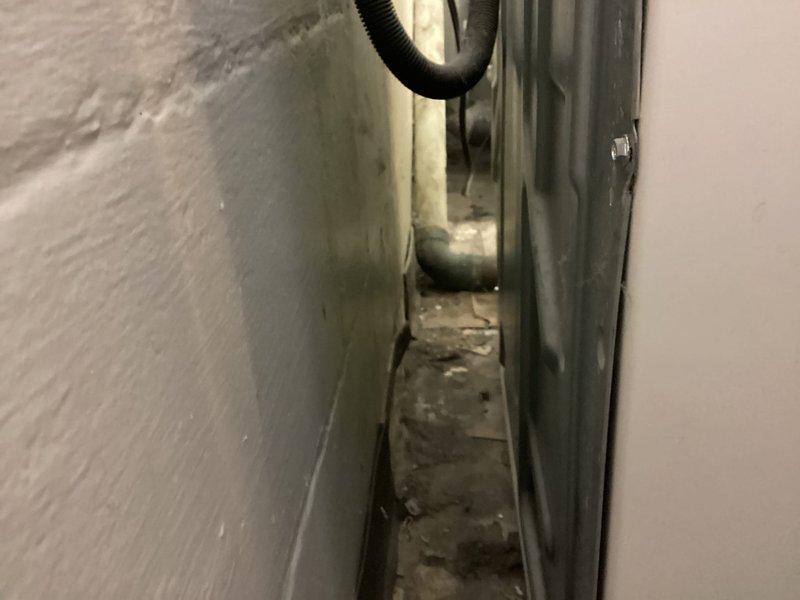 Performed system evaluation and documented existing water heater and plumbing configuration. Customer was previously advised that boiler system requires acid neutralizer installation to protect equipment from condensate corrosion and extend system lifespan. Photographed current utility room setup showing water heater, copper piping network, valves, and existing water treatment components for service records.