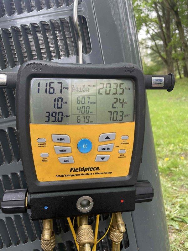 Completed club membership maintenance visit on residential HVAC system. Performed comprehensive system diagnostics using refrigerant manifold gauge, recording operating pressures of 116.7 PSI on low side and 203.5 PSI on high side with supply air temperature measuring 65.8°F. Provided customer with current warranty status information for their equipment as requested.
