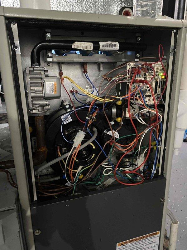 Returned to site to complete previously sold repair work involving replacement of faulty pressure switch and collector box cover. Accessed HVAC unit interior, removed defective pressure switch from control assembly, and installed new pressure switch ensuring proper electrical connections to the control board and safety circuit. Replaced damaged collector box cover to restore proper unit enclosure and maintain safe operation. Verified all wire connections were secure, tested pressure switch operation through system cycling, and confirmed unit returned to normal heating operation with all safety controls functioning correctly.